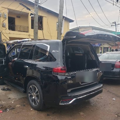 Black Toyota Land Cruiser rear with upgraded tail lights